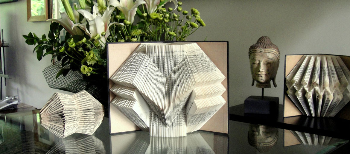 Book sculpture — folded vintage leather books